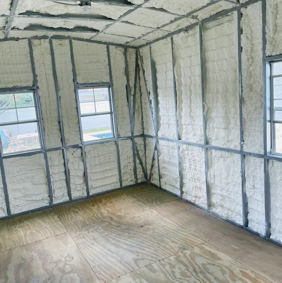 Closed-cell spray foam insulation applied to wall cavities in a residential project in Winston-Salem
